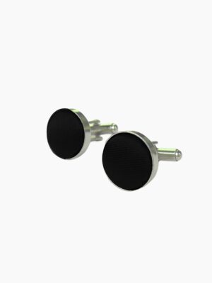 A pair of stylish black cufflinks with a shiny finish.