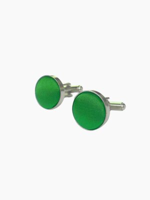 A pair of colove - colored cufflinks with a metallic edge.