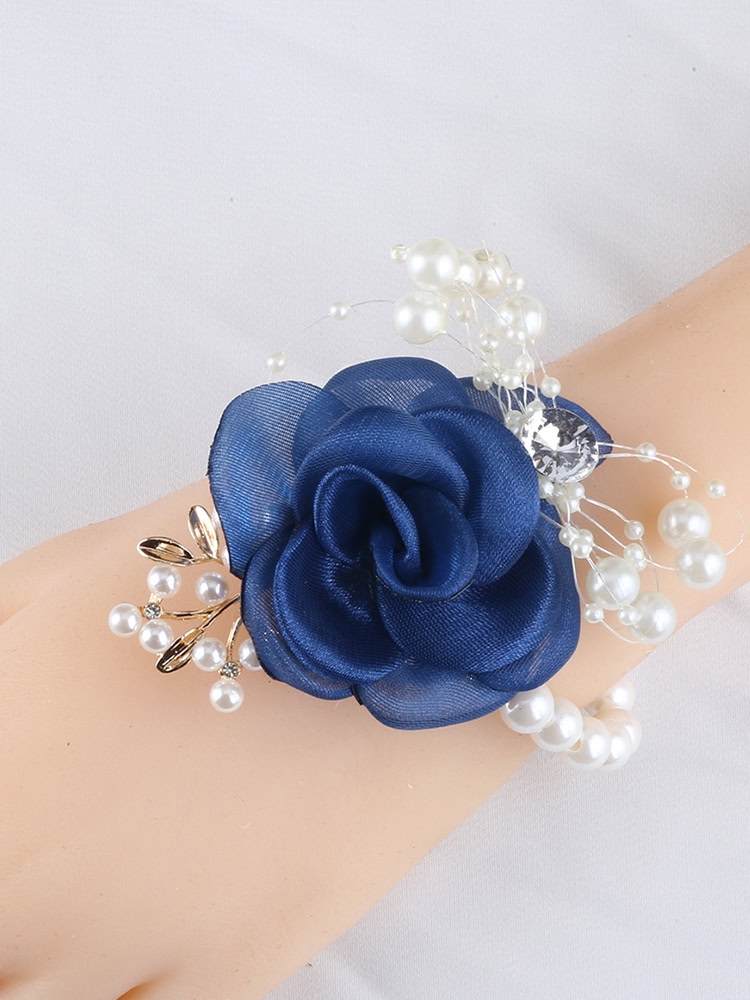 Navy blue rose wrist corsage with pearl and crystal accents