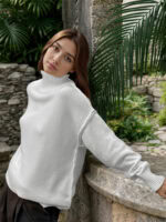 HIGH - NECK KNIT SWEATER IN BLACK, WHITE & CHAMPAGNE
