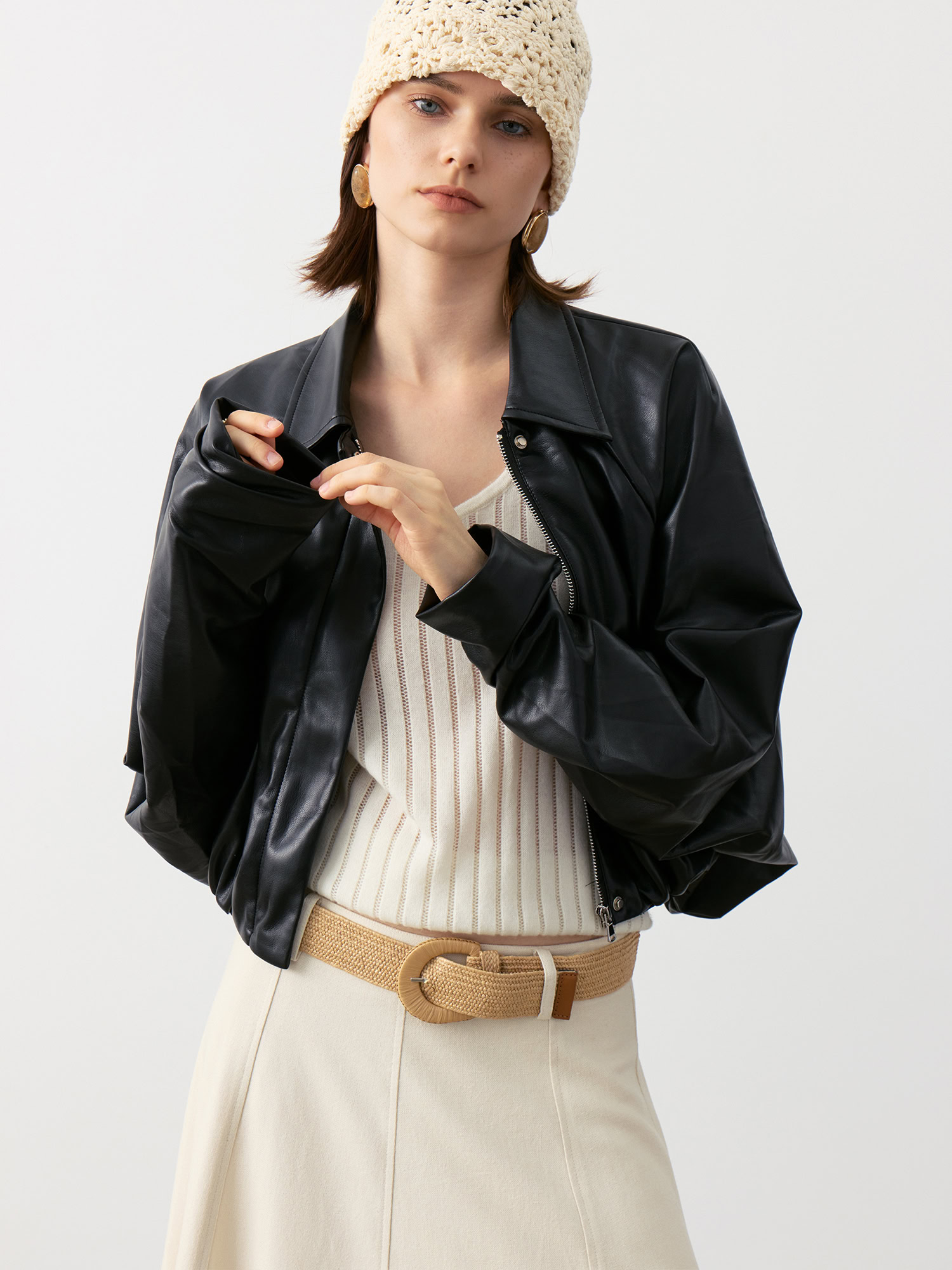 Close-up of 100% Cashmere V-Neck Ribbed Camisole in Ivory White, Showcasing Strap and Ribbed Texture